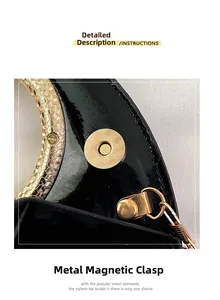 Detail view of the black patent leather bag featuring a gold magnetic clasp and metal handle