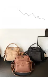 Waterproof nylon multi-layer crossbody bag shown in beige, brown, and black colors