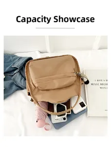 Top-down view of a spacious brown multi-layer crossbody bag showing ample interior storage space