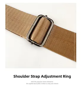 Detail of adjustable nylon shoulder strap with gunmetal rectangular metal buckle