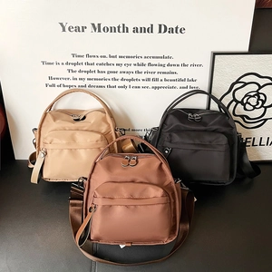Three-color minimalist nylon multi-layer crossbody bags in beige, tan, and black