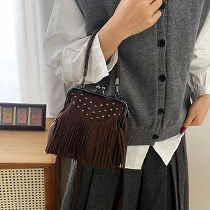 Vintage dark brown suede tote bag with fringe tassels and metal rivet accents