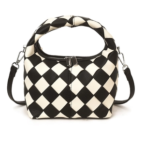 Classic black and white checkered crossbody handbag with a woven circular top handle