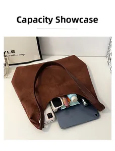 Top view of brown suede tote bag showing large capacity and internal storage space