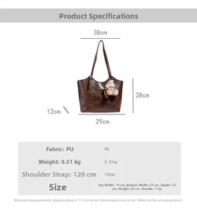 Size chart for brown PU tote bag with dimensions in cm and strap length details