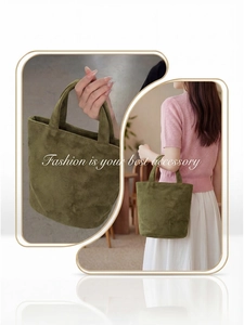 Detail of dark green velvet tote bag showing soft suede texture and stylish lifestyle look