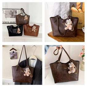 Detailed views of vintage large capacity tote bag with glossy leather and bear charm