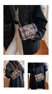 Detail of tweed flap bag with classic British plaid, gold chain strap and tassel charm