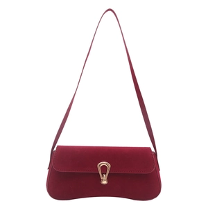 Retro burgundy suede baguette bag with minimalist gold buckle and slender shoulder strap