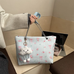 Light blue floral bucket bag with chain strap and cute plush cloud charm detail
