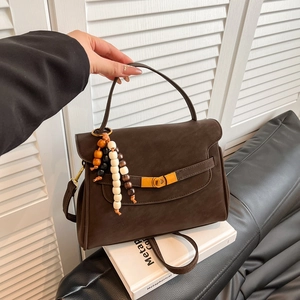 Vintage dark brown matte square crossbody bag with decorative wooden beads and metal lock
