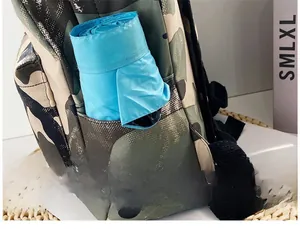Detail of camouflaged nylon backpack side pocket with a blue outdoor accessory