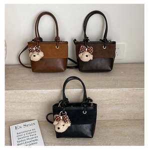 Retro contrast bucket bag with leather splicing and cute bear charm in three colors