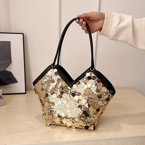 Large golden sequin tote bag with black handles and V-shaped opening for elegant parties