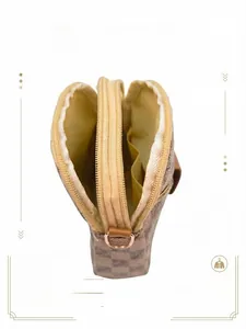 Dual-compartment interior view of a checkered phone bag showing storage capacity