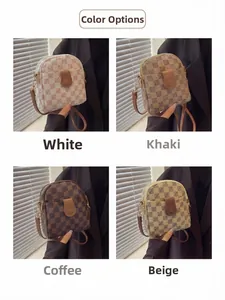 Detail view of mini crossbody phone bags in four checkered colors with double zippers