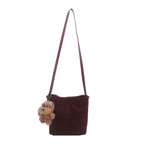 Retro leopard print bucket bag in dark red suede with cute plush bear keychain