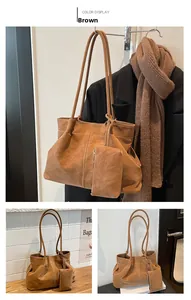 Brown suede tote bag with white contrast stitching and matching zippered coin purse