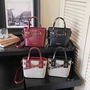 Chic retro bucket bag collection with leather and canvas styles on display