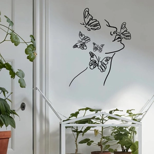 Minimalist black linear wall decal featuring a woman profile and butterflies for home decor