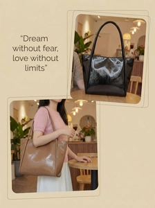 Detail of high-gloss oil wax leather tote bags in black and brown for daily commute