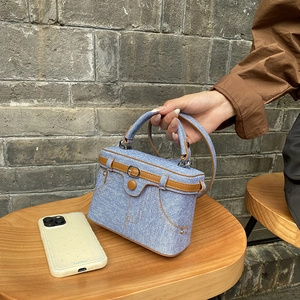 Denim and leather box handbag with jean pocket design and top handle for women