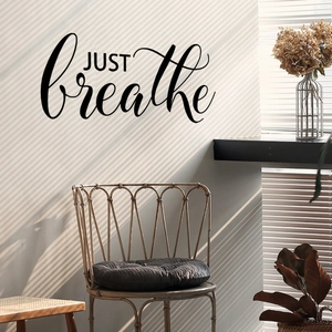 Modern JUST breathe vinyl wall decal for living room with elegant minimalist script