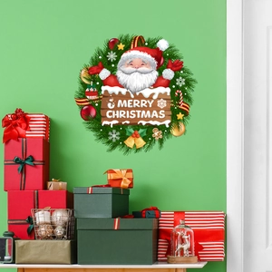 Christmas Santa Claus wreath wall sticker with Merry Christmas sign on green wall