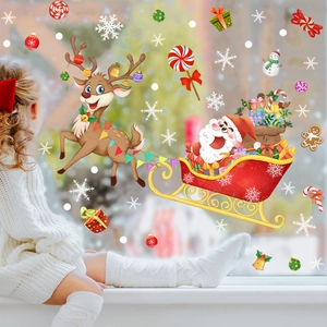 Christmas window decals with Santa Claus and reindeer on glass for festive home decoration