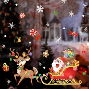 Christmas window decals with Santa Claus on a sleigh, reindeer, and snowflakes stickers