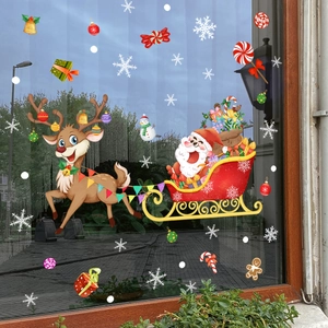Detail showing Santa Claus on a sleigh with reindeer and snowflakes window stickers
