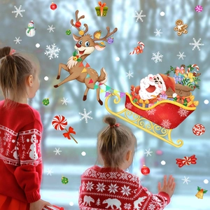 Christmas window clings with Santa, reindeer and snowflakes for festive home decoration