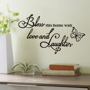Bless this home with love and laughter wall decal featuring elegant butterflies
