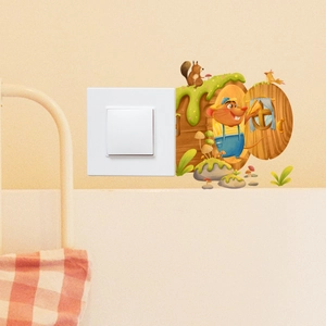 Cartoon mouse hole wall decal around a light switch in a cozy bedroom setting