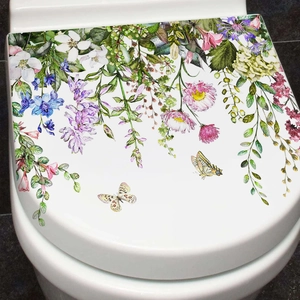 Floral butterfly wall sticker on a white toilet seat with realistic daisies and lavender