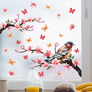 Static cling window stickers featuring birds on floral branches and colorful butterflies