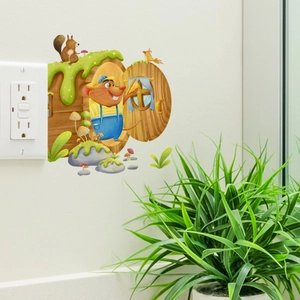 Detailed view of 3D cartoon mouse hole wall sticker applied near a bedroom light switch