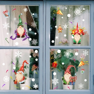 Detailed view of festive Christmas gnome static window stickers with snowflakes and gifts