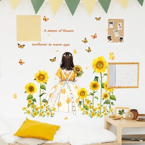 Detail of sunflower and girl wall sticker with butterflies and quote for bedroom decor