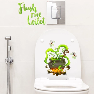 Halloween toilet lid sticker featuring ghost, witch cauldron and Flush THE toilet sign