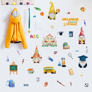 Close-up of school themed wall stickers with gnomes and school bus for kids room decor