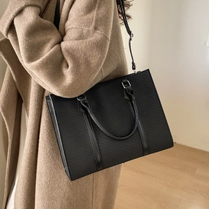 Black large capacity tote bag with diagonal texture and dual handles for commuting