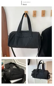 Detailed views of a black waterproof duffel bag showing versatile handles and shoulder strap