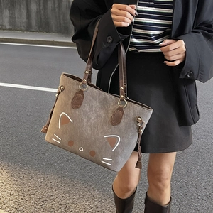 Sac fourre-tout gris en daim avec motif chat mignon et poignées à anneaux métalliques