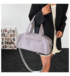 Detail of light purple large capacity nylon sports gym bag with adjustable strap