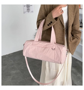 Nylon bowling bag detail featuring pink cylinder shape and soft wrinkled texture fabric