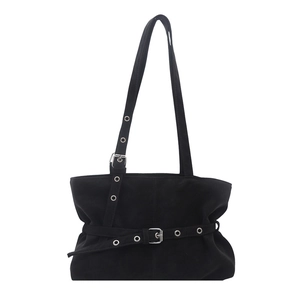 Black suede shoulder bag with silver metal eyelets and large capacity for commuting