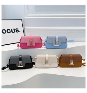 Five assorted colors of minimalist saddle bags with woven texture and gold metal buckle