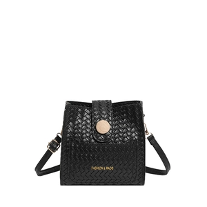 Black woven leather bucket bag with decorative wooden buckle and fashion logo