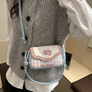 Pink and blue apple shaped shoulder bag with cherry patch and decorative bow